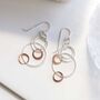 Silver And Rose Gold Swinging Circles Dangly Earrings, thumbnail 8 of 10