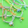 Kids Personalised Enamel Charm Suede Slider Bracelet, thumbnail 1 of 11