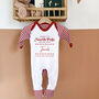 North Pole 'Baby’s 1st Christmas' 2025 Pyjamas Or Rompersuit, thumbnail 1 of 6