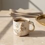 Handmade White Floral Butterfly Ceramic Mug With Golden Accents, thumbnail 1 of 2