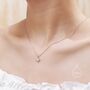 Tiny Starburst Pendant Necklace In Sterling Silver, thumbnail 1 of 12
