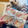 Retro Name Personalised Christmas Wrapping Paper, thumbnail 1 of 2