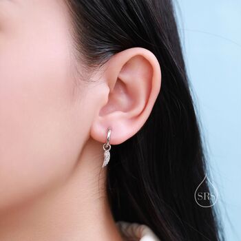 Mismatched Angel And Demon Wing Huggie Hoop Earrings In Sterling Silver, 2 of 11