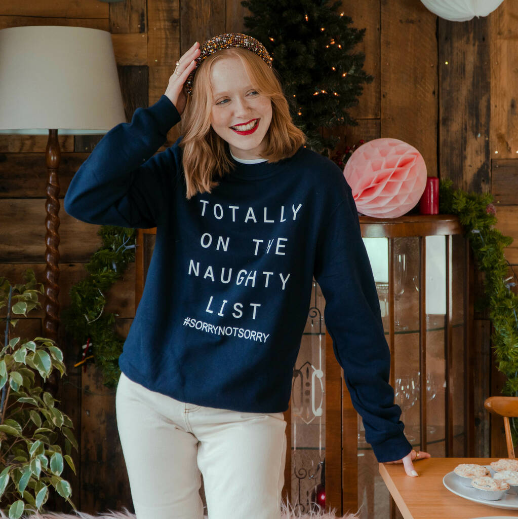 'On The Naughty List' Christmas Jumper Sweatshirt, 1 of 9