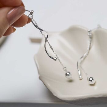 Sterling Silver Dancing Twist And Ball Stud Earrings, 3 of 7