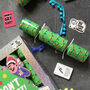 Green Christmas Crackers With 'Don't Get Got' Game Set Of Six, thumbnail 2 of 5