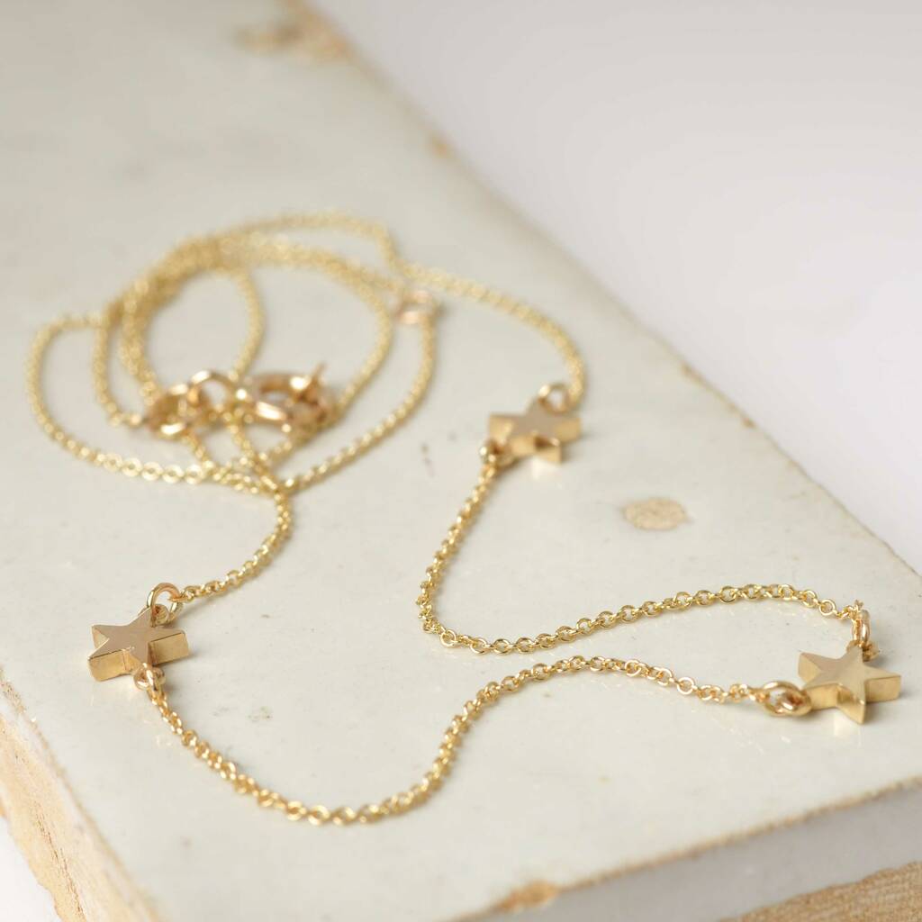 Three Little Solid Gold Stars Necklace, 1 of 3