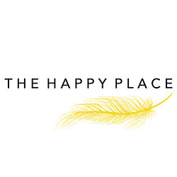 The happy place logo with pampas grass.