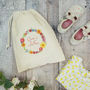Personalised Floral Wreath Spare Clothes Bag, thumbnail 1 of 3