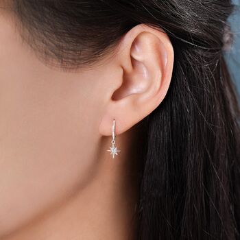 Sterling Silver Tiny Starburst Huggie Hoop Earrings, 5 of 10
