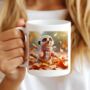 Personalised Autumn Meerkat Playing In Leaves Gift Mug, thumbnail 1 of 2