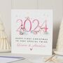Personalised Twins First Christmas Card For Twin Girls, thumbnail 1 of 7