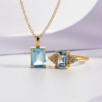 Blue Topaz Emerald Cut Pendant Necklace In Sterling Silver And Gold, 8 of 11