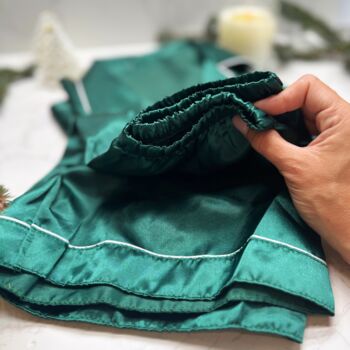 Luxury Christmas Pyjama Gift Set For Her – Festive Green Satin Pjs, Candle, Socks And Hair Bow, 6 of 9