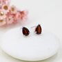 Sterling Silver Genuine Garnet Droplet Stud Earrings, thumbnail 1 of 10