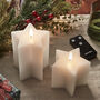 Two White Wax Star Shaped Tru Glow® LED Battery Candles, thumbnail 3 of 4