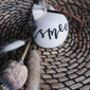 Personalised Calligraphy Ceramic Christmas Bauble, thumbnail 1 of 4