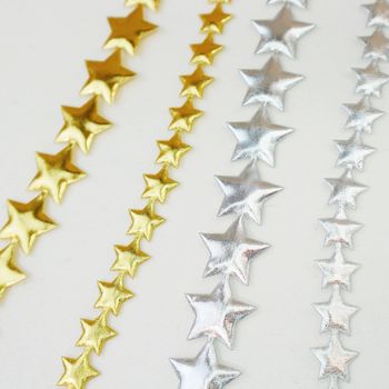 Metallic Star Ribbon Garland In Gold And Silver, 2 of 5