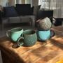 Set Of Four Reactive Glaze Mugs In Tones Of The Rainforest, thumbnail 1 of 11