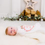 Personalised Heart Baby First Christmas Babygrow, thumbnail 4 of 9