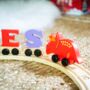 Personalised Brightly Coloured Dinosaur Wooden Train, thumbnail 2 of 3