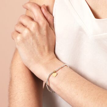 Stainless Steel Pull Cord Heart Charm Bracelet In Gold, 3 of 4