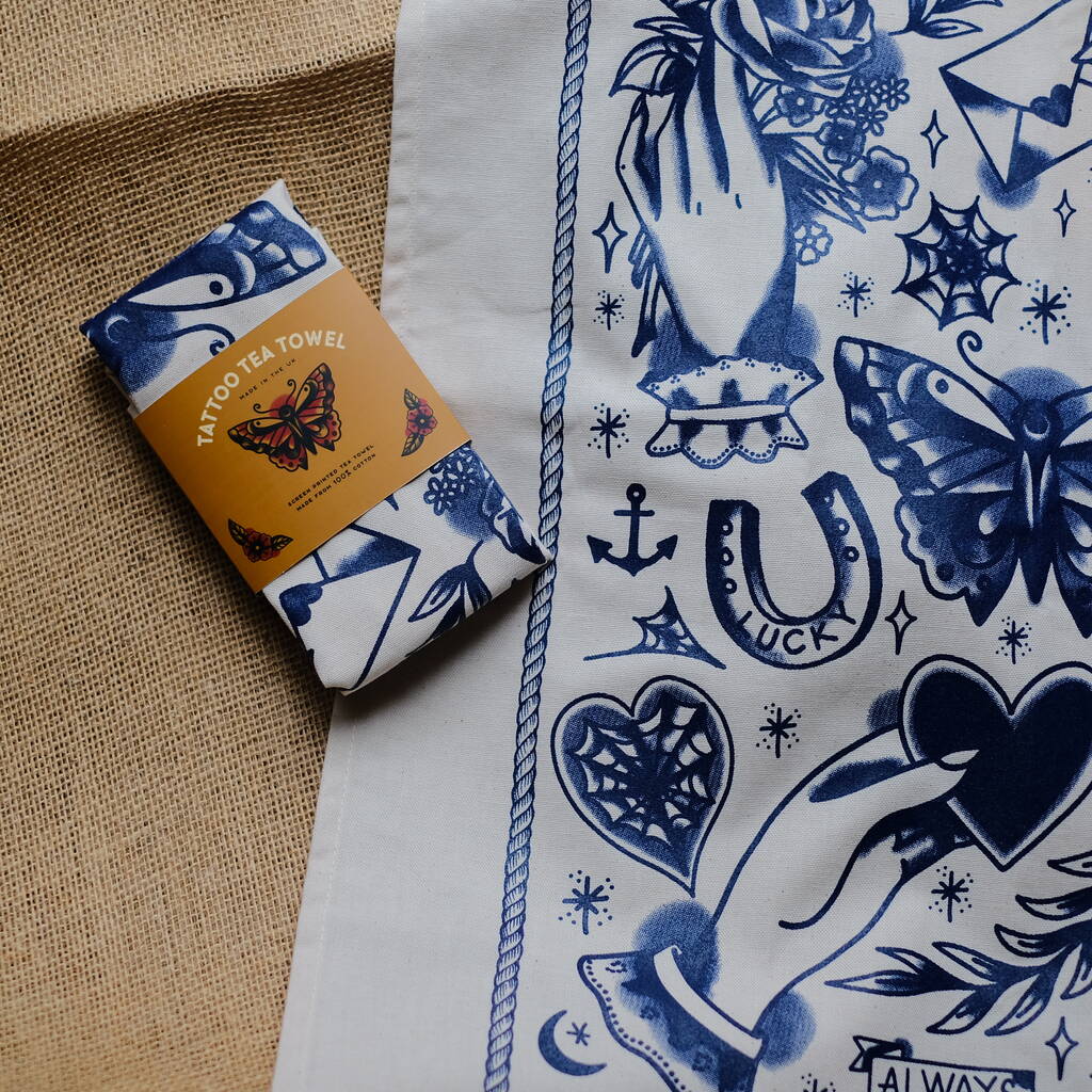 Traditional Tattoo Navy Blue Screen Printed Tea Towel, 1 of 7