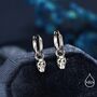 Sterling Silver Extra Tiny Skull Huggie Hoop Earrings, thumbnail 1 of 11