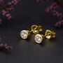 Gold Plated Sterling Silver April Cubic Zirconia Birthstone Stud Earrings, thumbnail 1 of 5