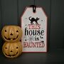 Metal 'This House Is Haunted' Halloween Sign, thumbnail 1 of 3