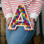 ‘Read’ Plywood And Wool Pom Pom Letters Decoration, thumbnail 2 of 6