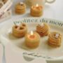 A Box Of Four Biscuit Shape Candles, thumbnail 1 of 5