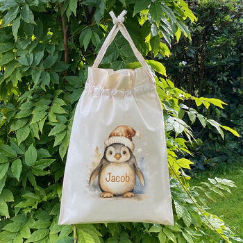 Personalised Penguin Drawstring Christmas Gift Bag, 3 of 4