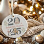 Personalised 2025 Baby's First Christmas Ceramic Bauble In Red, Pink Or Blue, thumbnail 2 of 9