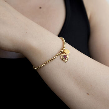Personalised Gold And Red Sacred Heart Ball Bracelet, 2 of 4