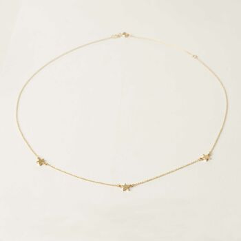 Three Little Solid Gold Stars Necklace, 2 of 3