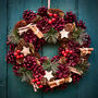 Festive Stars Christmas Wreath, thumbnail 1 of 4