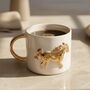 Handmade White Ceramic Mug With Gold Horse, thumbnail 1 of 3