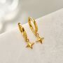 Sterling Silver Tiny Four Point Star Huggie Hoop Earrings, thumbnail 6 of 11