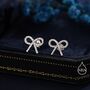 Sterling Silver Cz Ribbon Bow Stud Earrings, thumbnail 1 of 12
