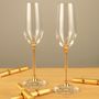 Pair Of Champagne Flutes With Gold Swarovski Crystals, thumbnail 1 of 5