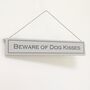 'Beware Of Dog Kisses' Hand Painted Wooden Sign, thumbnail 1 of 2