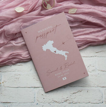 Dusky Pink Passport Invitation With Acrylic Plane Charms For Destination Wedding, 2 of 9