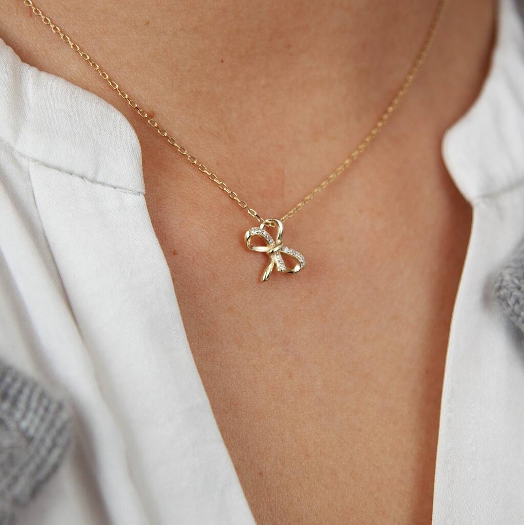 Gold Sparkle Bow Pendant Necklace By Attic