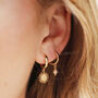 Sunburst Star Charm Hoop Earrings In Gold Plating, thumbnail 1 of 8