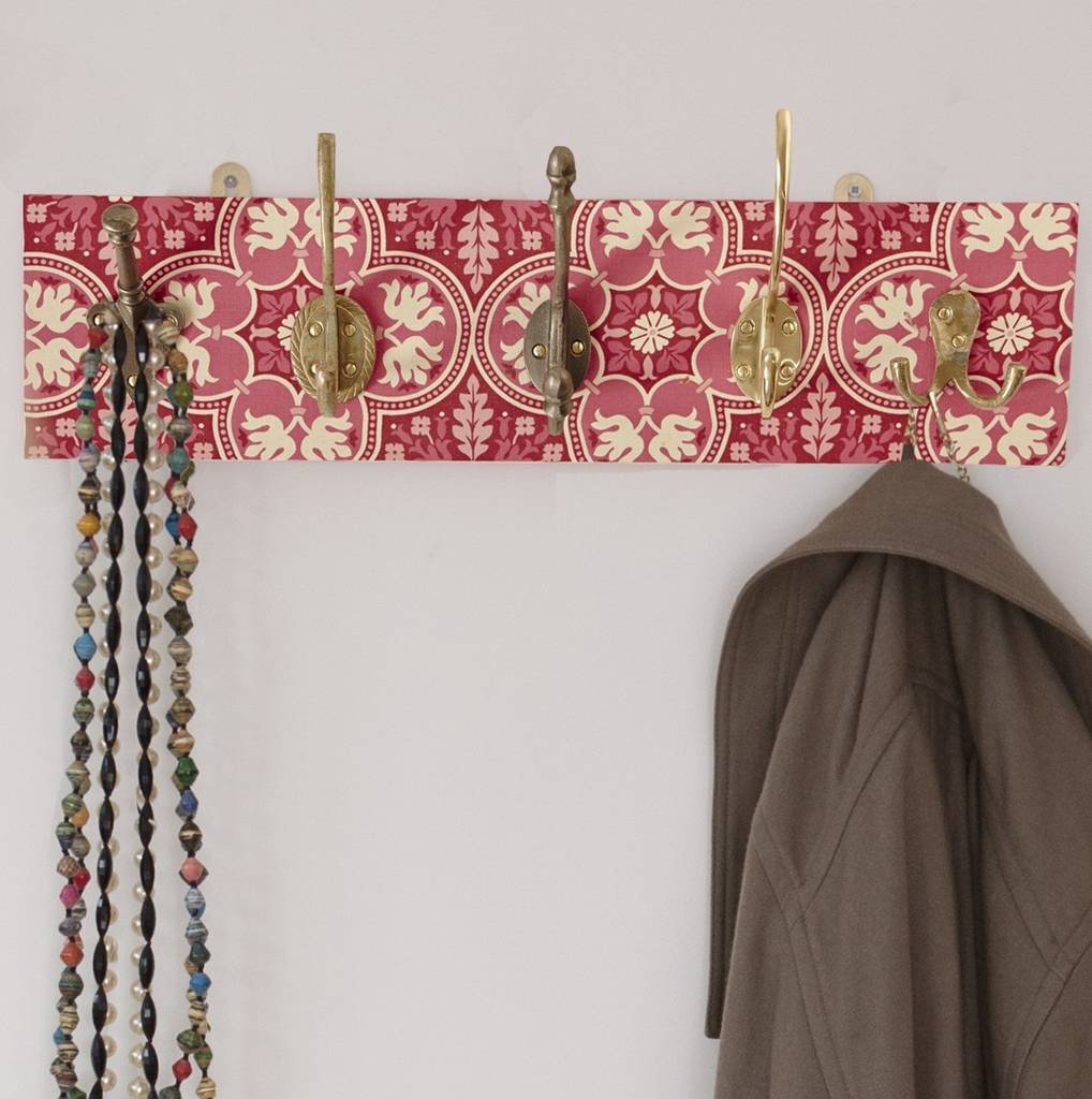pink coat rack with three or five mismatched hooks by deja ooh