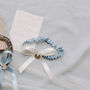 Lucky Silver Sixpence Blue And Ivory Wedding Garter, thumbnail 4 of 5
