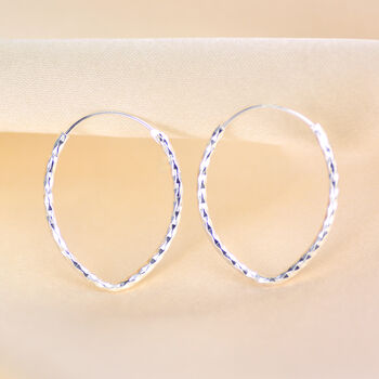 Sterling Silver Medium Hammered Oval Hoop Earrings, 4 of 6
