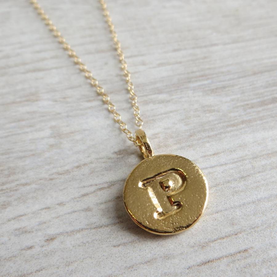 handmade gold embossed letter necklace by gracie collins