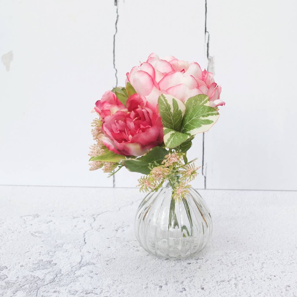 pink artificial peony bouquet in glass vase by abigail bryans designs